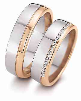 Bicolor-Trauringe von Juwelier Zero mit kleinem Diamanten-Besatz für die Braut.
